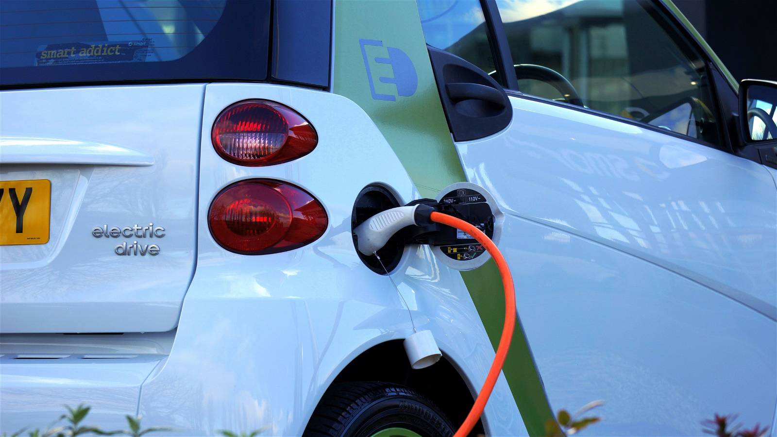 How will consumer perceptions of electric vehicles influence purchase intentions?
