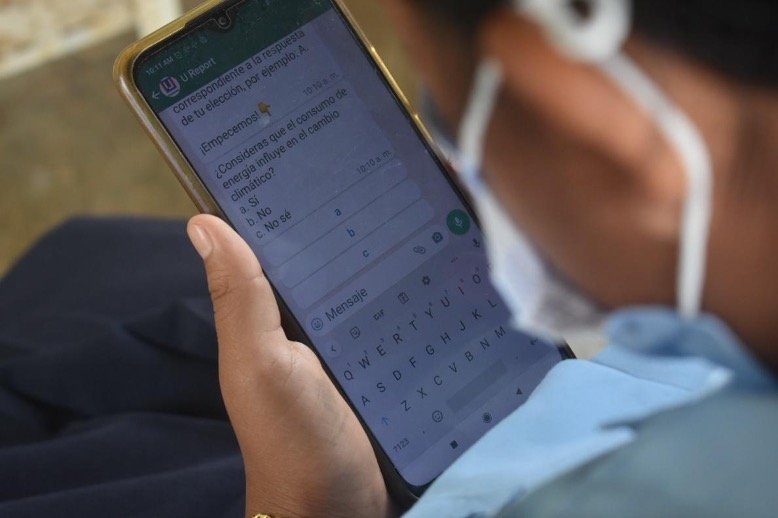  Child taking the survey via UNICEF's U-Report Chat Bot