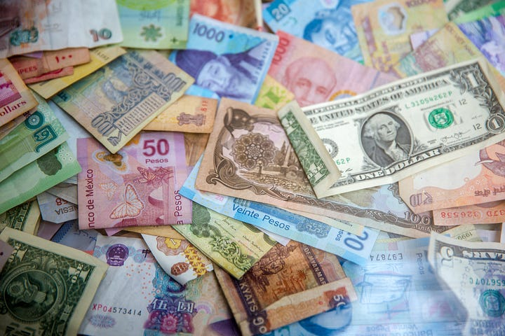 Figure 3: Different currency bills, Source: Photo by Jason Leung.